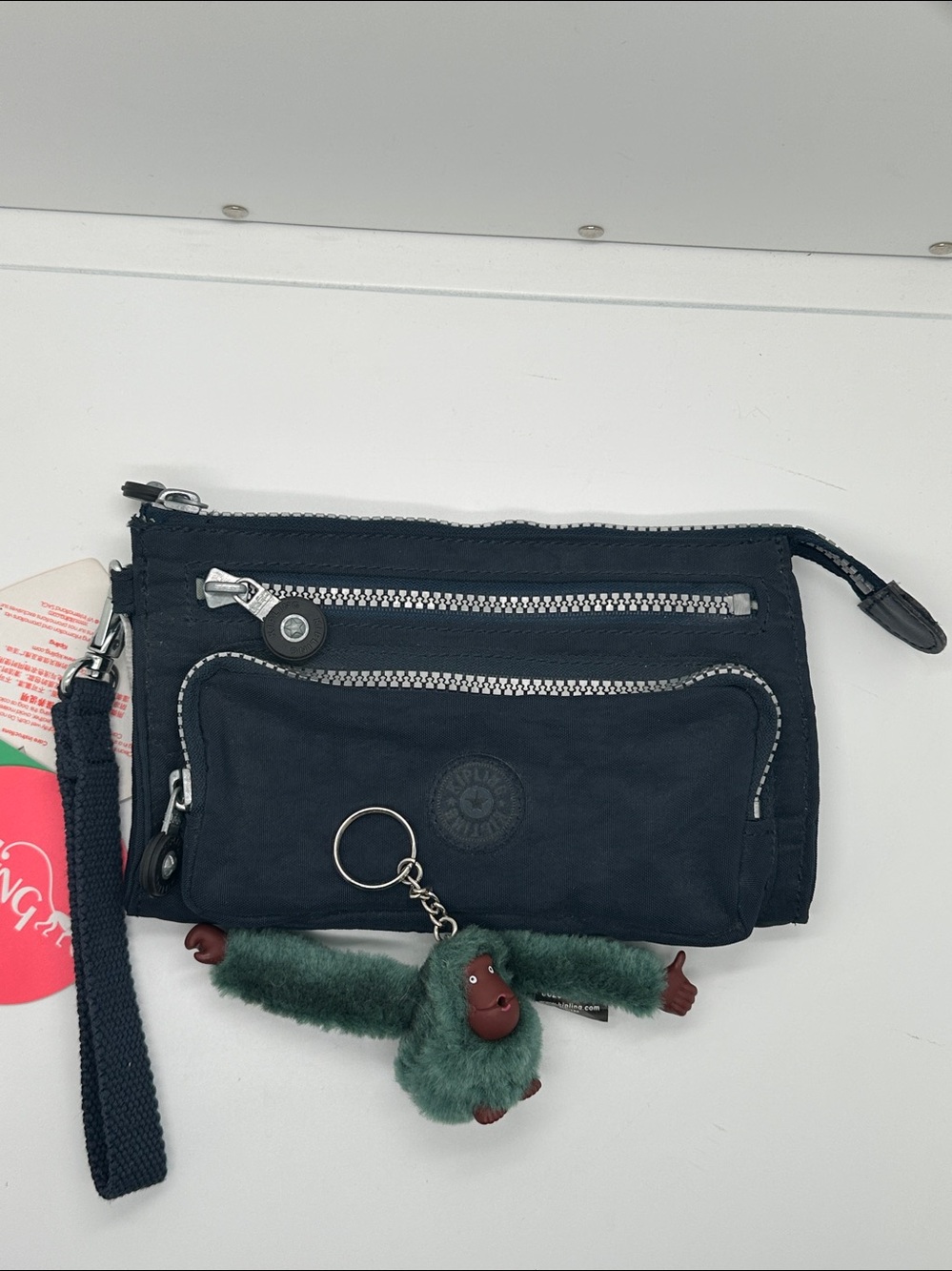 Kipling Navy Blue Wristlet with Elin Monkey Charm NWT